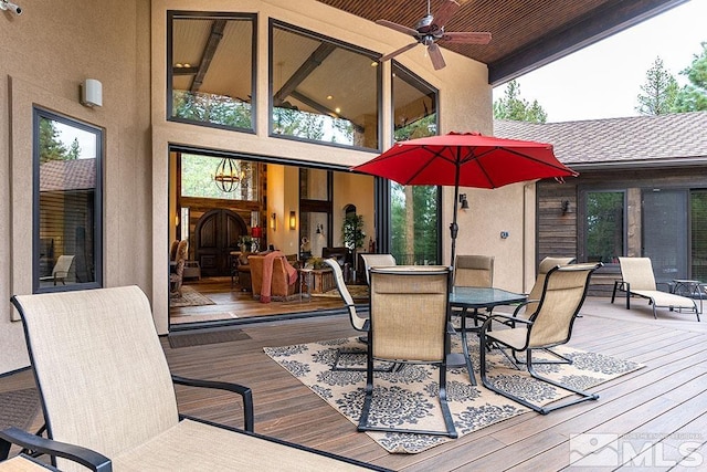 wooden terrace with ceiling fan