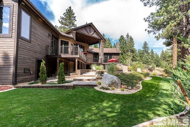 view of yard with a wooden deck