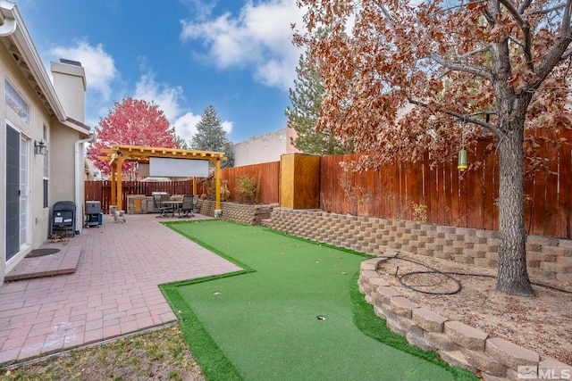 view of yard featuring a pergola and a patio