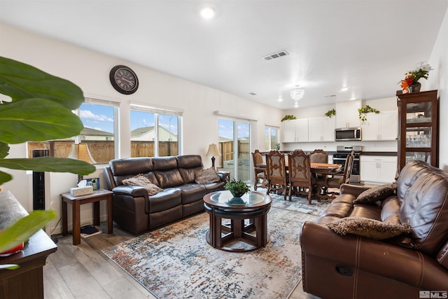 living room with light wood-type flooring