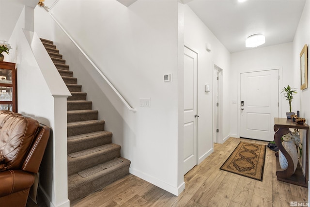 foyer entrance featuring light wood-type flooring