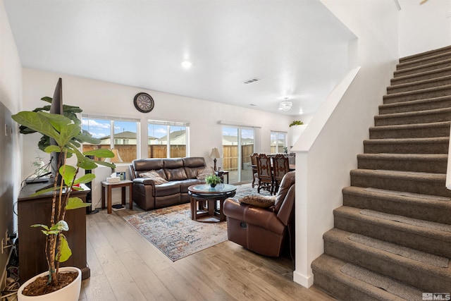 living room with light hardwood / wood-style floors