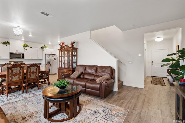 living room featuring light hardwood / wood-style flooring