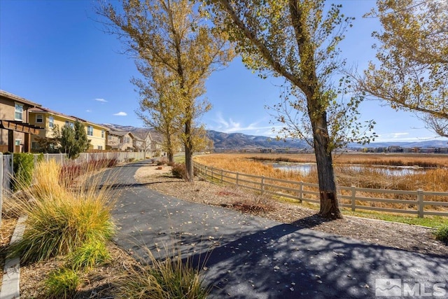 view of road featuring a mountain view and a rural view