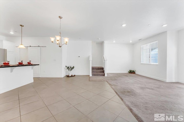 unfurnished living room featuring light colored carpet