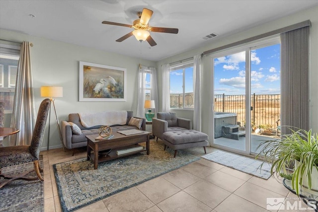 interior space featuring ceiling fan