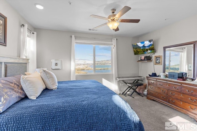 bedroom featuring carpet floors and ceiling fan