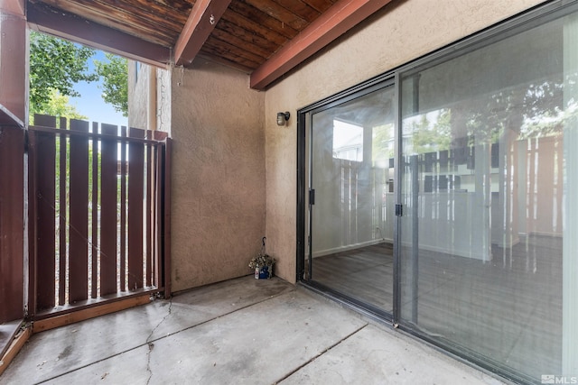 entrance to property with a patio area