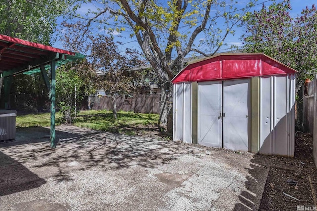 view of outbuilding with central air condition unit