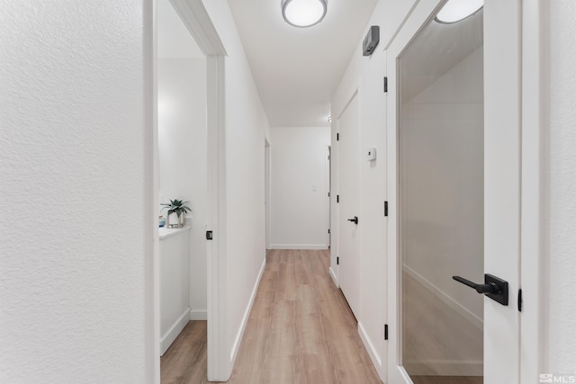 hall featuring light wood-type flooring