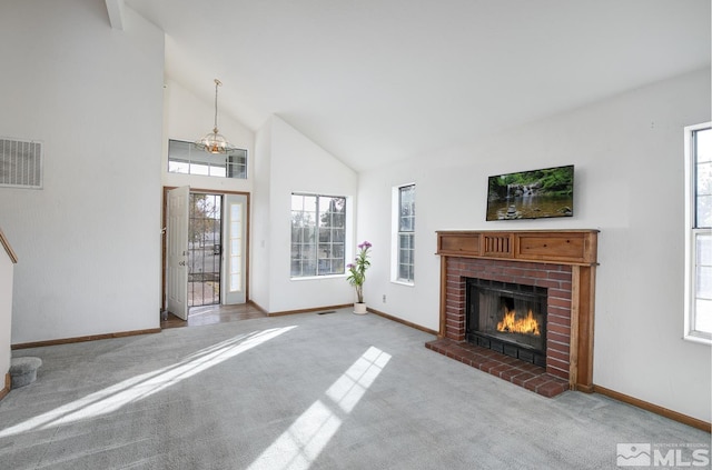 unfurnished living room with carpet flooring and a wealth of natural light