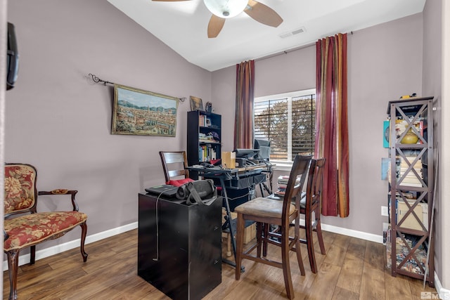 office space featuring hardwood / wood-style flooring, ceiling fan, and lofted ceiling