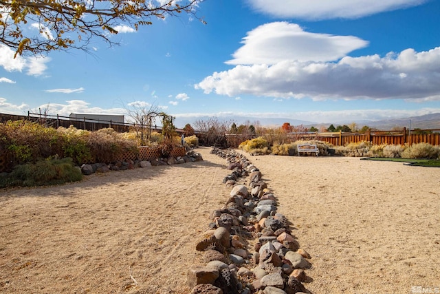 view of yard with a mountain view