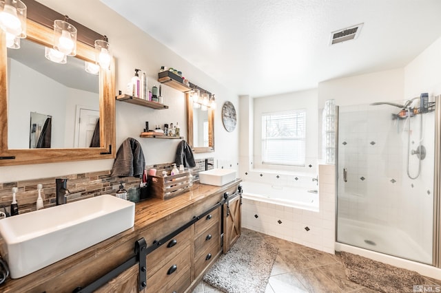 bathroom featuring vanity, tile patterned floors, and independent shower and bath