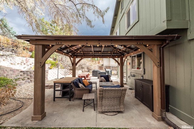 view of patio / terrace featuring outdoor lounge area and a gazebo