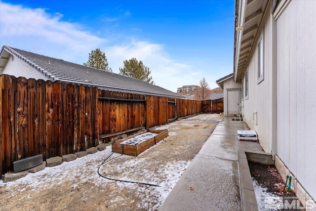 view of snowy yard