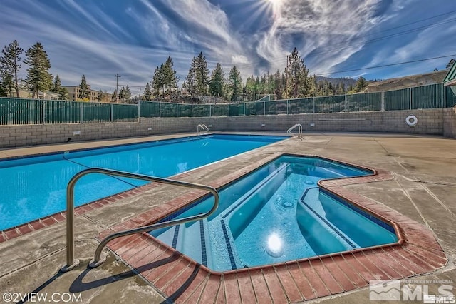 view of pool with a patio area