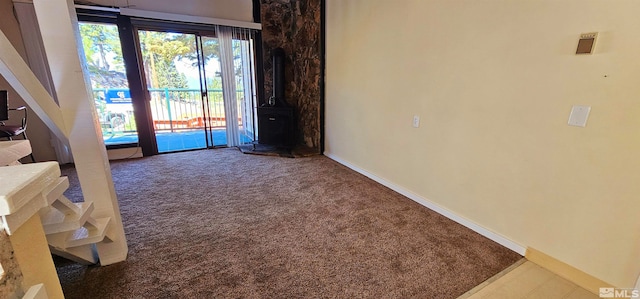 view of carpeted foyer