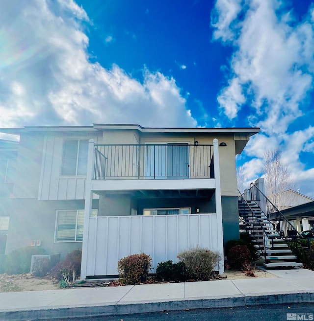 exterior space with a balcony