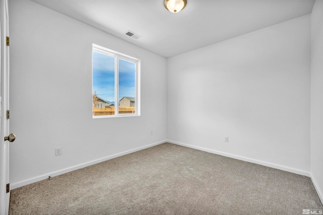 view of carpeted spare room