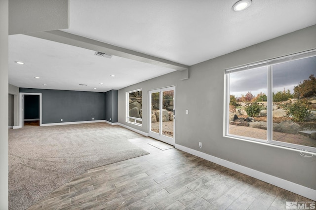 unfurnished room featuring light hardwood / wood-style floors