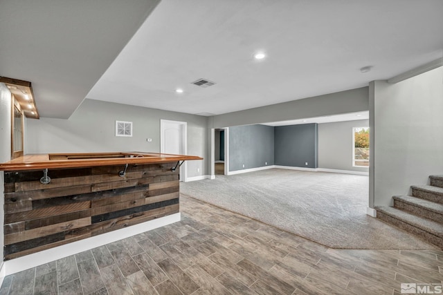 interior space featuring wood counters and hardwood / wood-style flooring