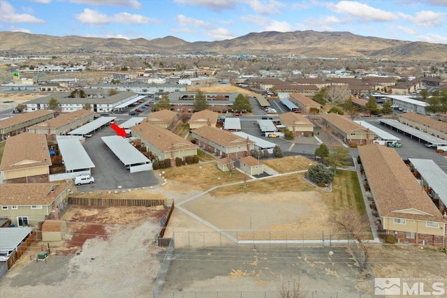 drone / aerial view featuring a mountain view