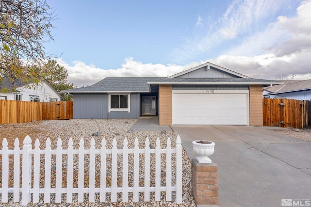 single story home featuring a garage