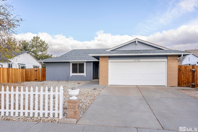 ranch-style house featuring a garage