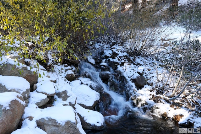 view of snow covered land