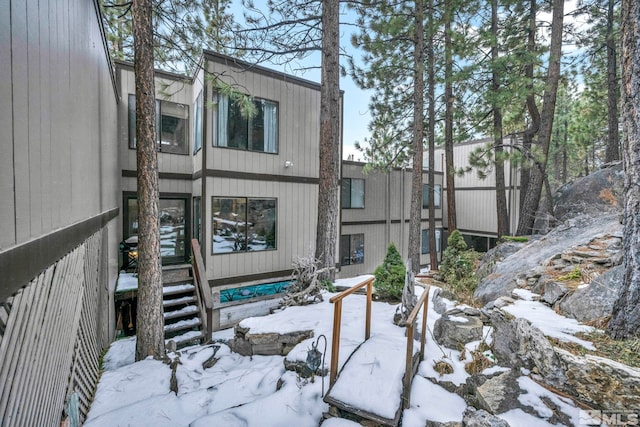 view of snow covered property