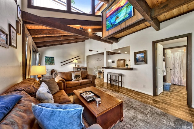 living room with hardwood / wood-style flooring, wood ceiling, beamed ceiling, and high vaulted ceiling