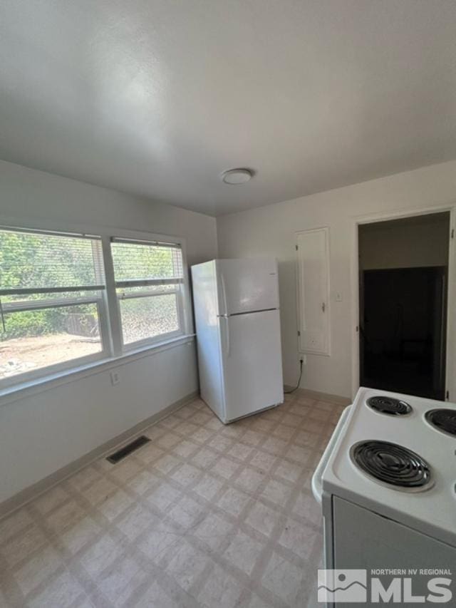 kitchen featuring white appliances