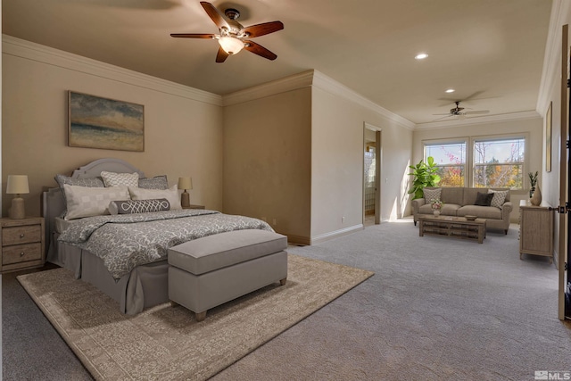 carpeted bedroom featuring ceiling fan, crown molding, and connected bathroom