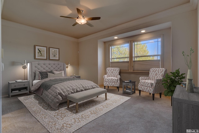 carpeted bedroom with ceiling fan and ornamental molding