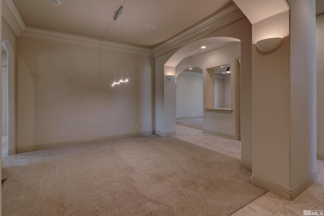 unfurnished room featuring ceiling fan, light colored carpet, and ornamental molding