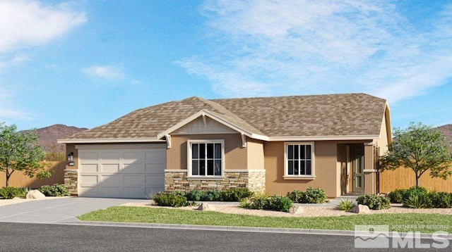 view of front of home featuring a mountain view and a garage