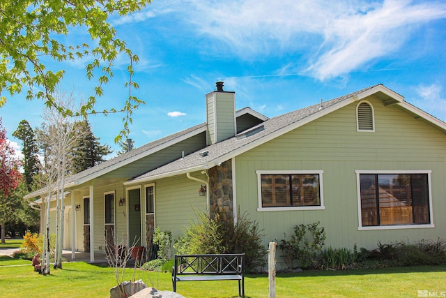 exterior space with a front lawn