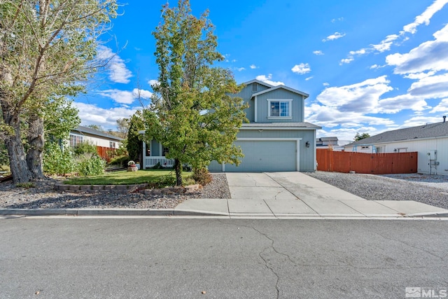 view of front of house with a front yard and a garage