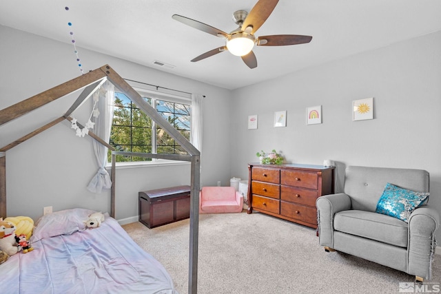 carpeted bedroom with ceiling fan