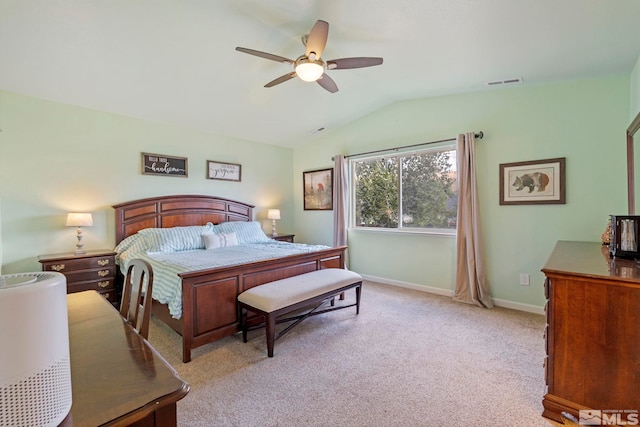 carpeted bedroom featuring ceiling fan and lofted ceiling