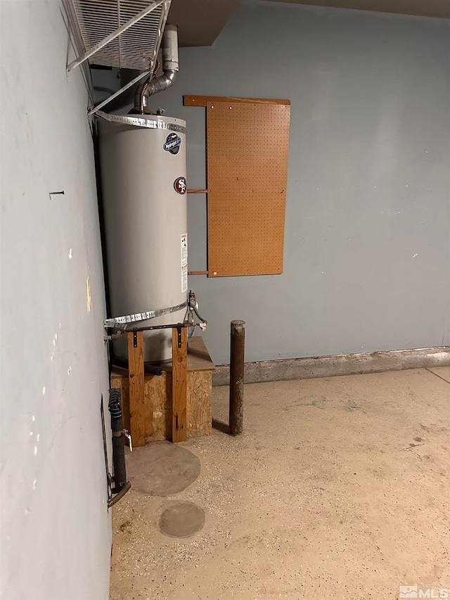 utility room featuring gas water heater