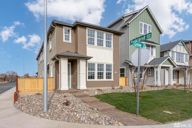 view of front of home with a front lawn