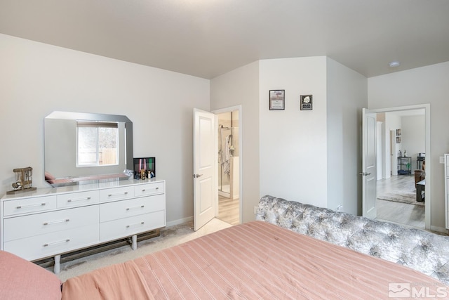 bedroom featuring light hardwood / wood-style flooring