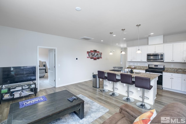 living room featuring light hardwood / wood-style flooring