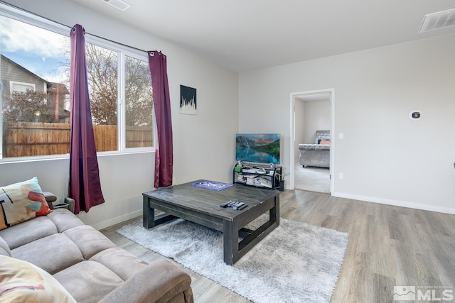 living room featuring light wood-type flooring