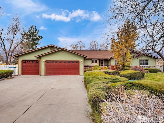 single story home featuring a garage