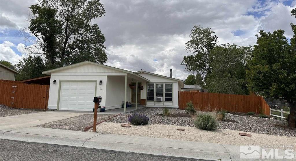 single story home with a garage