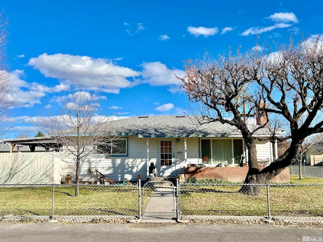 ranch-style home featuring a front yard