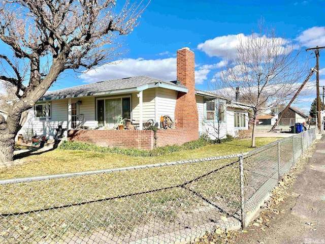 exterior space with a front yard